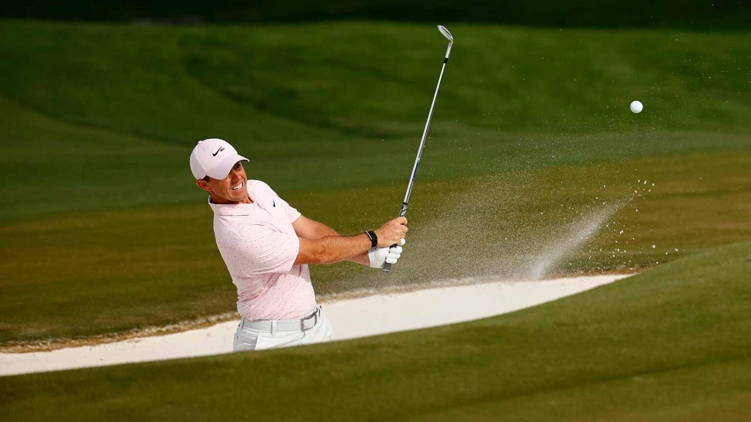 Play Better Bunker Shots by Checking Your Back Shoulder