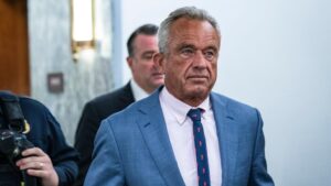 RFK Jr. Takes a Dip in Sewage Water: Health Experts Urge You to Stay Away!