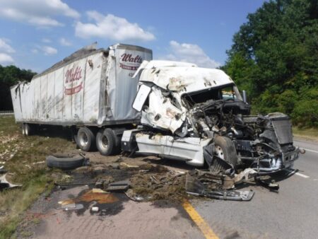 Garbage Truck Overturns at Golf & Wolf, Sparking Lengthy Cleanup Effort